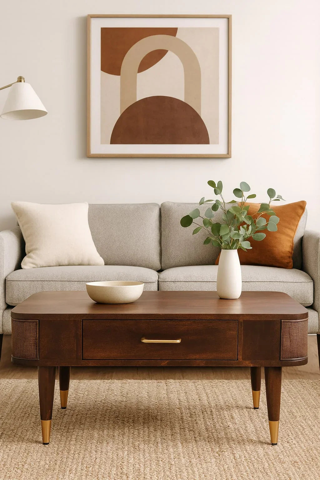 handcrafted solid mango wood coffee table with brass accents and rattan side panels – Delano Home