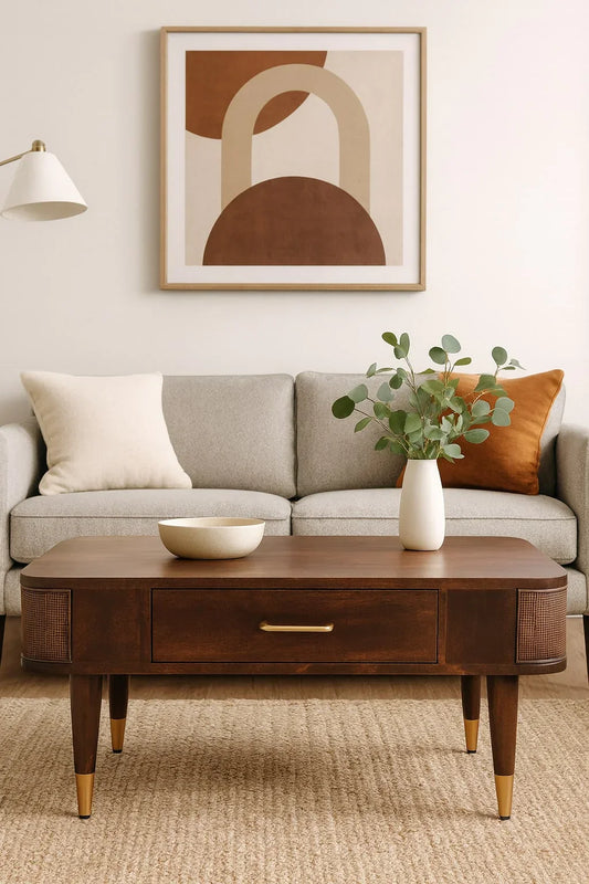 handcrafted solid mango wood coffee table with brass accents and rattan side panels – Delano Home